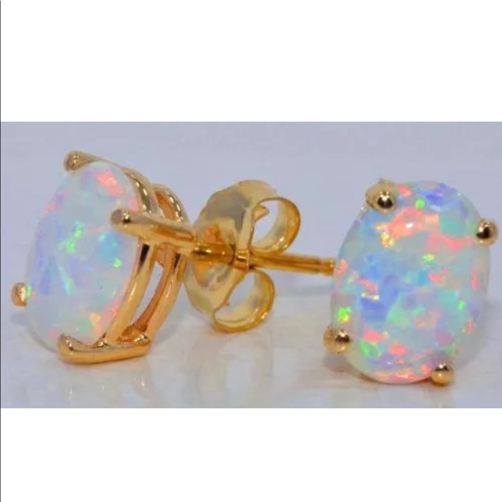 8x6mm opal stud earrings 14kt yellow gold